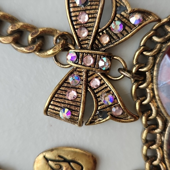 BETSEY JOHNSON 32" Long Goldtone Animal Print Heart Necklace - Picture 6 of 9